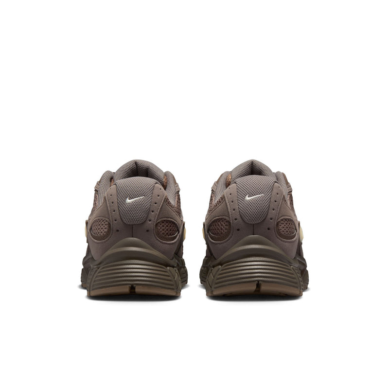 Men's running shoes rear view, cushioned heel and lace loops with textured collar