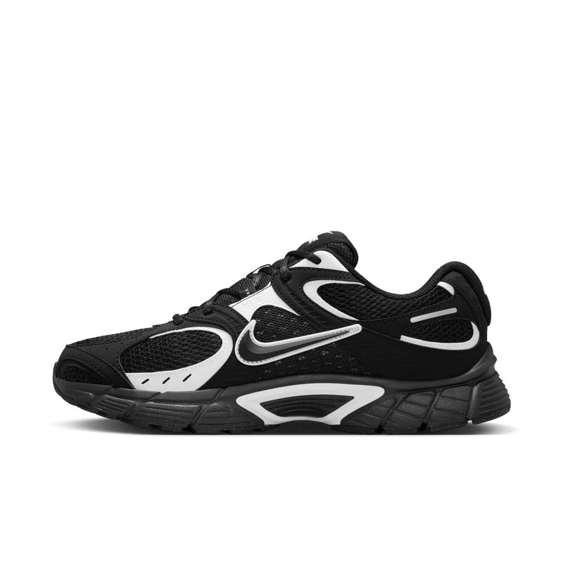 Men's black and white lace-up Nike running shoes, angled side profile