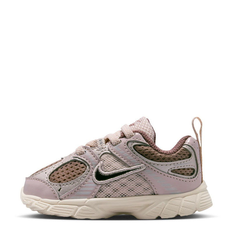 Toddler lace-up sneakers, side view, light taupe mesh with dark panels and green swoosh