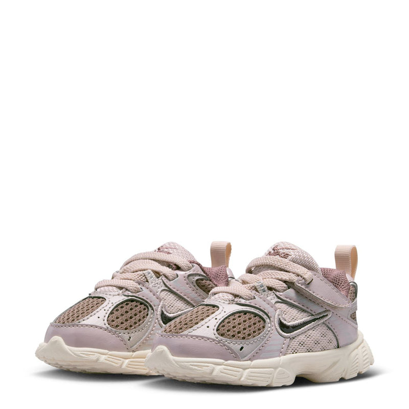 Toddler pair of lace-up sneakers in light taupe with mesh uppers and cushioned soles
