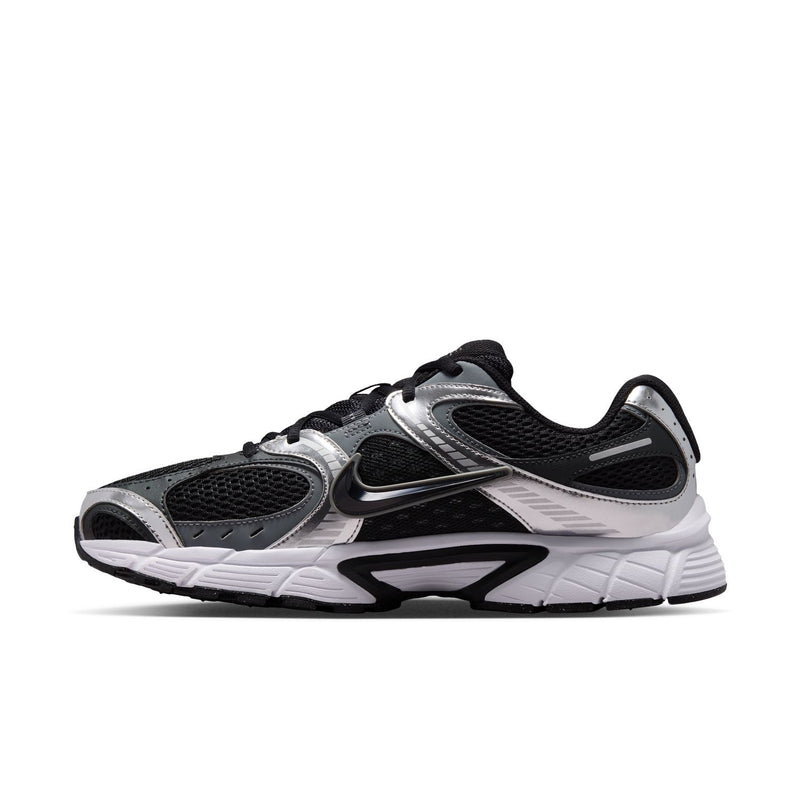 Men's running shoe side view in black, silver, and grey with white midsole and laces.