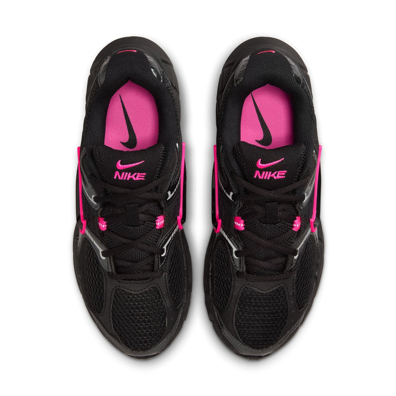 Women's black running shoes with pink interior lining and laces, Nike tongue logo