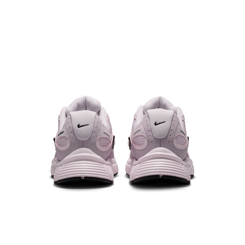 Lilac Nike running sneakers rear view with cushioned heel tabs