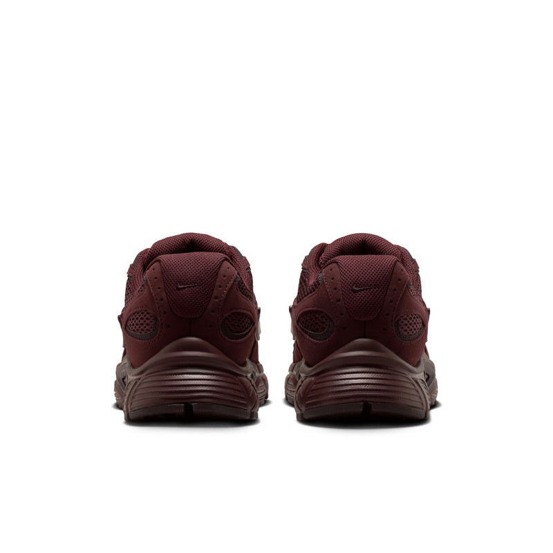 Women's burgundy lace-up sneakers with cushioned collar and rubber heel