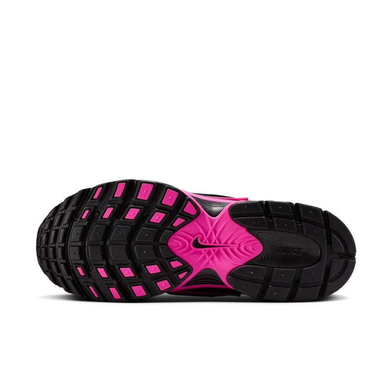 Women's black outsole with pink traction pattern and molded midfoot support