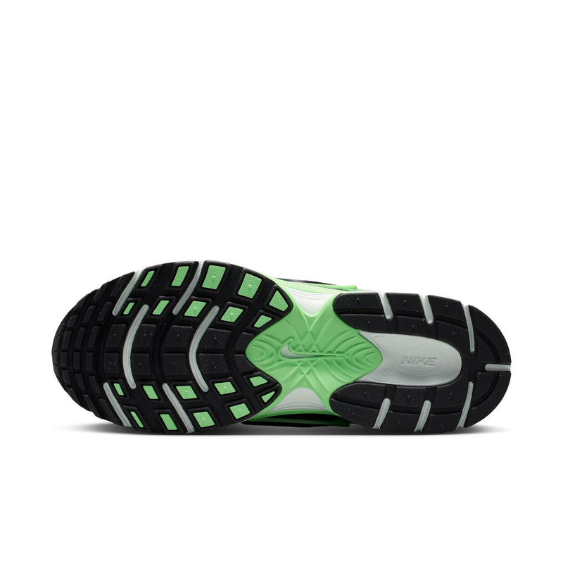 Women's green and black shoe outsole with tread pattern and Nike on heel