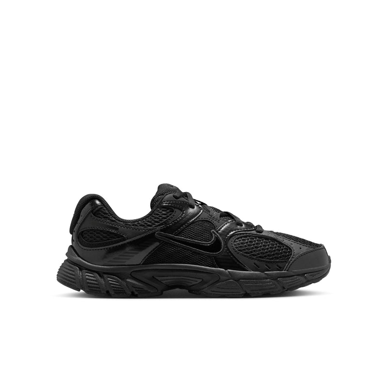Youth black running shoes with mesh upper, lace-up front, and chunky rubber sole.