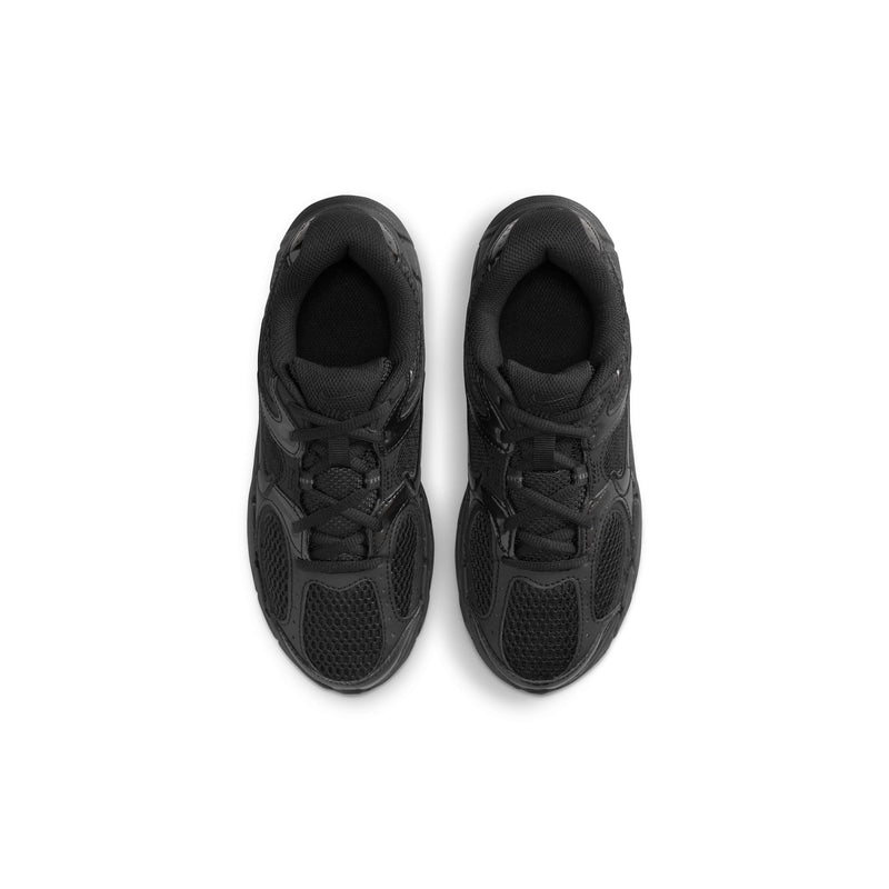 Pair of youth black lace-up sneakers with cushioned tongue and round toe.
