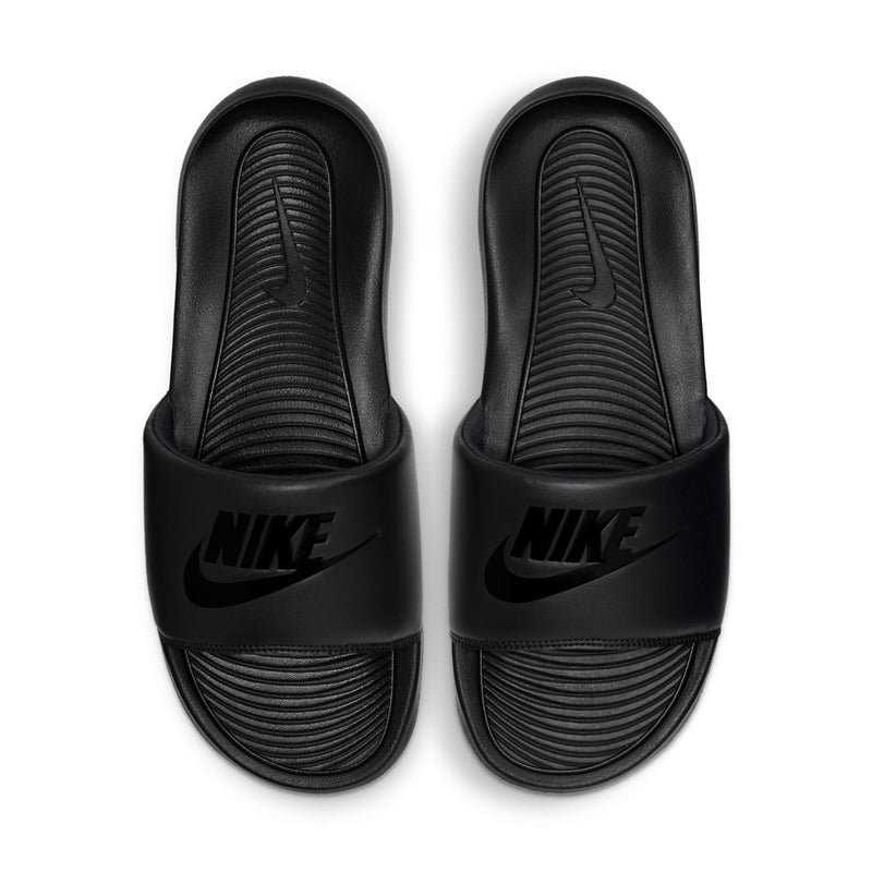 Men's black slide sandals showing heel cups and Nike logo on strap
