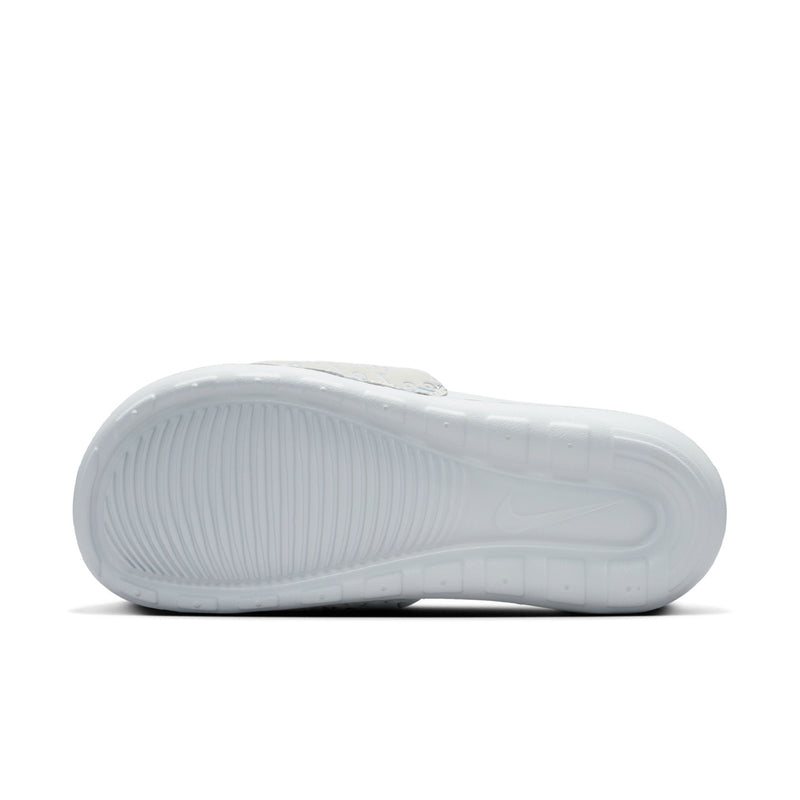 Women’s slide sandal outsole view, light gray molded rubber tread