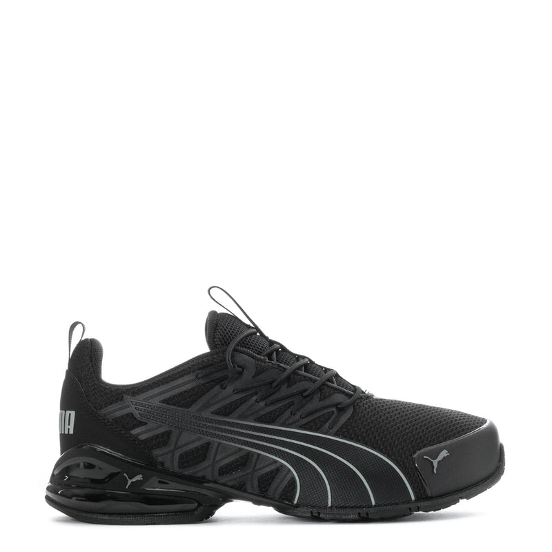 Kids black running shoes with Puma logo and lace-up front