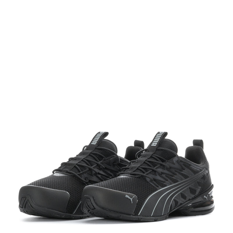 Kids black running shoes with mesh upper and cushioned sole, front view