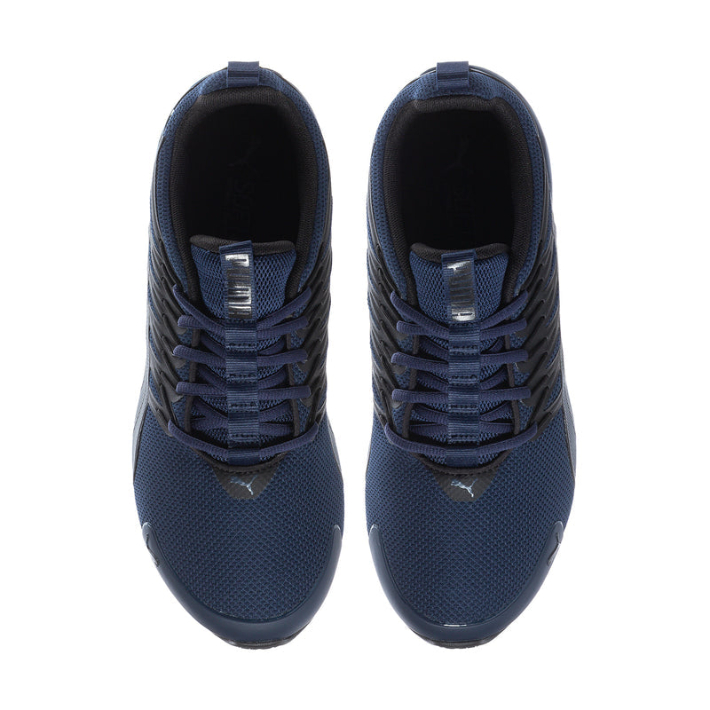Navy knit-style sneakers with lace-up front and black interior lining