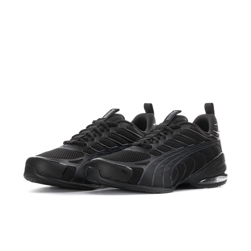 Men's Puma lace-up sneakers with dark black mesh upper and glossy midsole