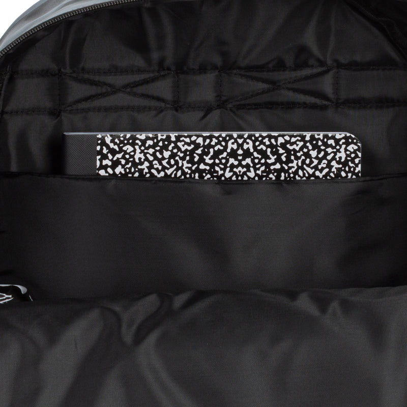 Black backpack interior pocket with leopard-print fabric panel