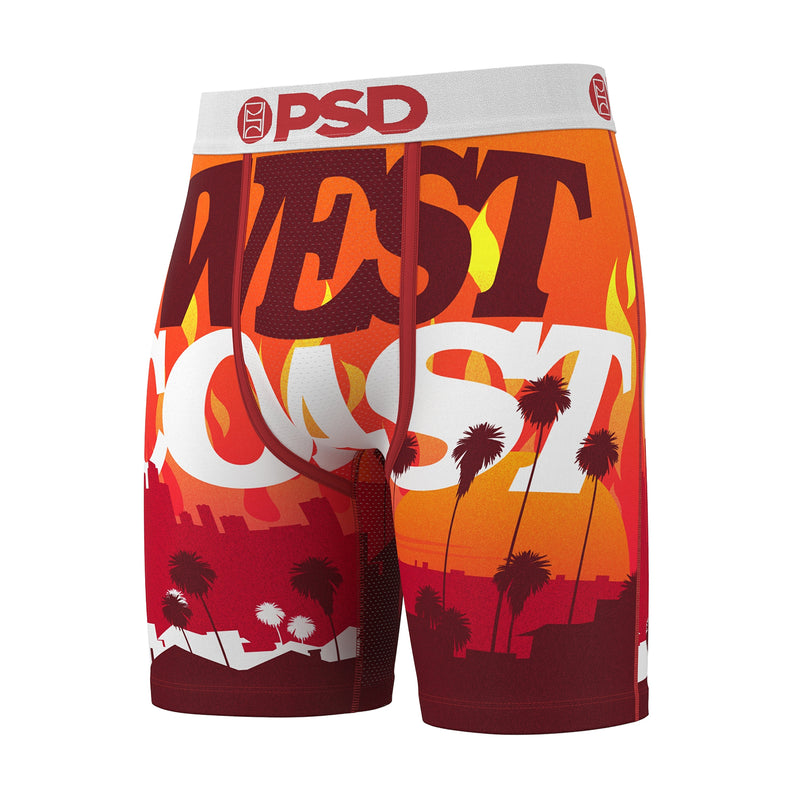 Men's boxer shorts, orange-red tropical print with palm trees and skyline, front view