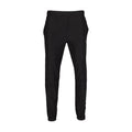 Black wind pants with elastic waistband and tapered legs