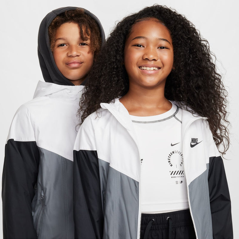 Youth hooded windbreaker jacket, white front with smoke grey and black accents, Nike logos