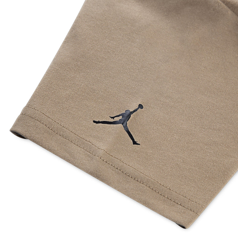 Tan T-shirt with embroidered Jordan Jumpman logo on the hem
