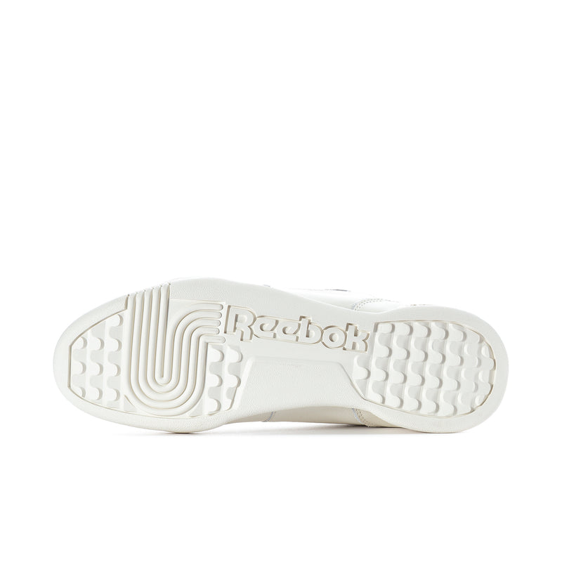 White rubber outsole with textured tread and Reebok logo stamp.