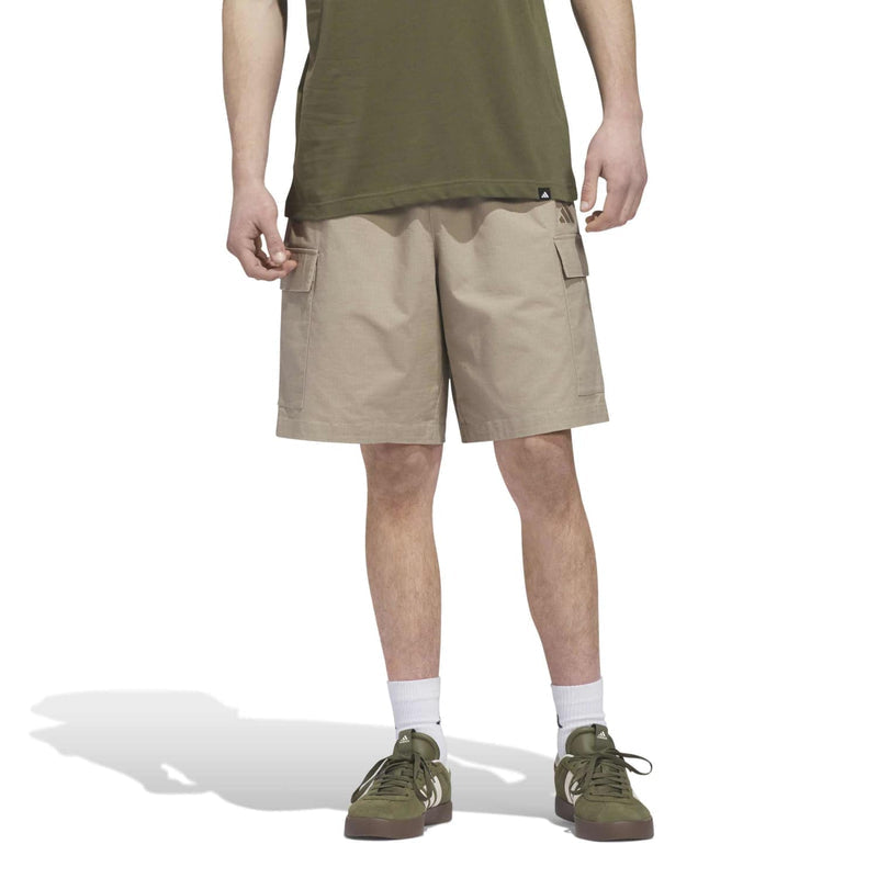 Khaki woven cargo shorts with side flap pockets and relaxed fit