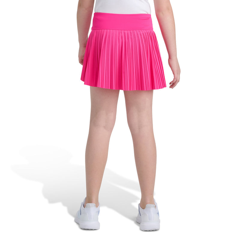 Youth shock pink pleated skort back view with elastic waistband, flared hem