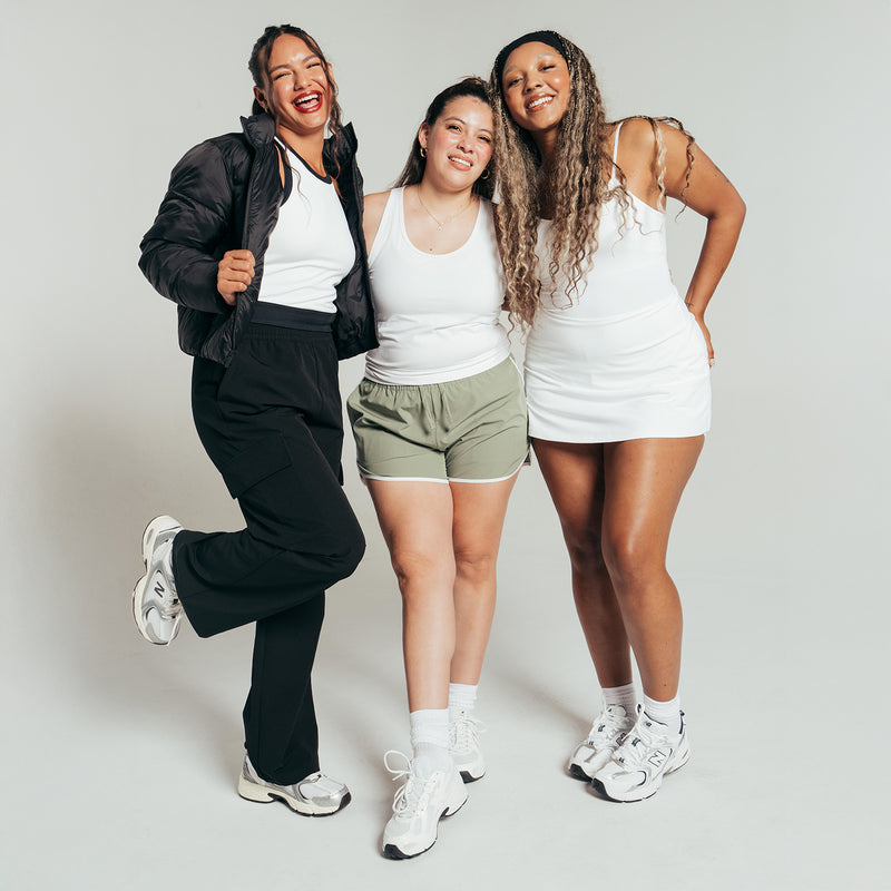 Sea spray running shorts on women with white tops and sneakers