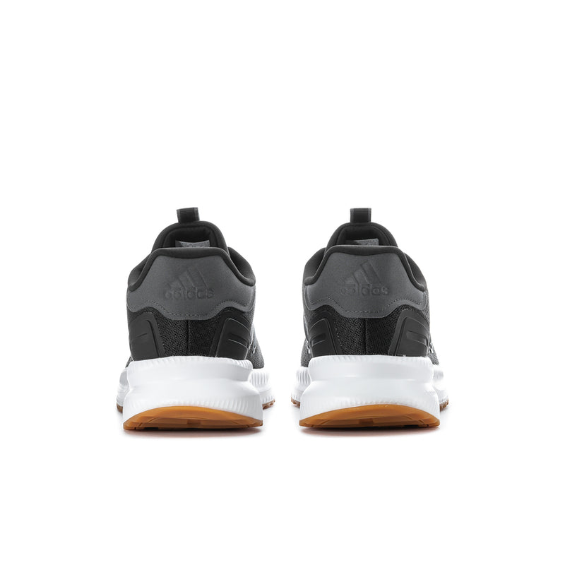 Men's wide running shoes, black back view with white midsole and gum outsole edge