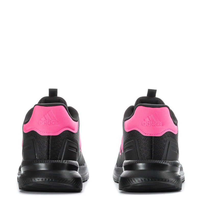 Youth black sneakers from the back with pink heel panels and black pull tabs