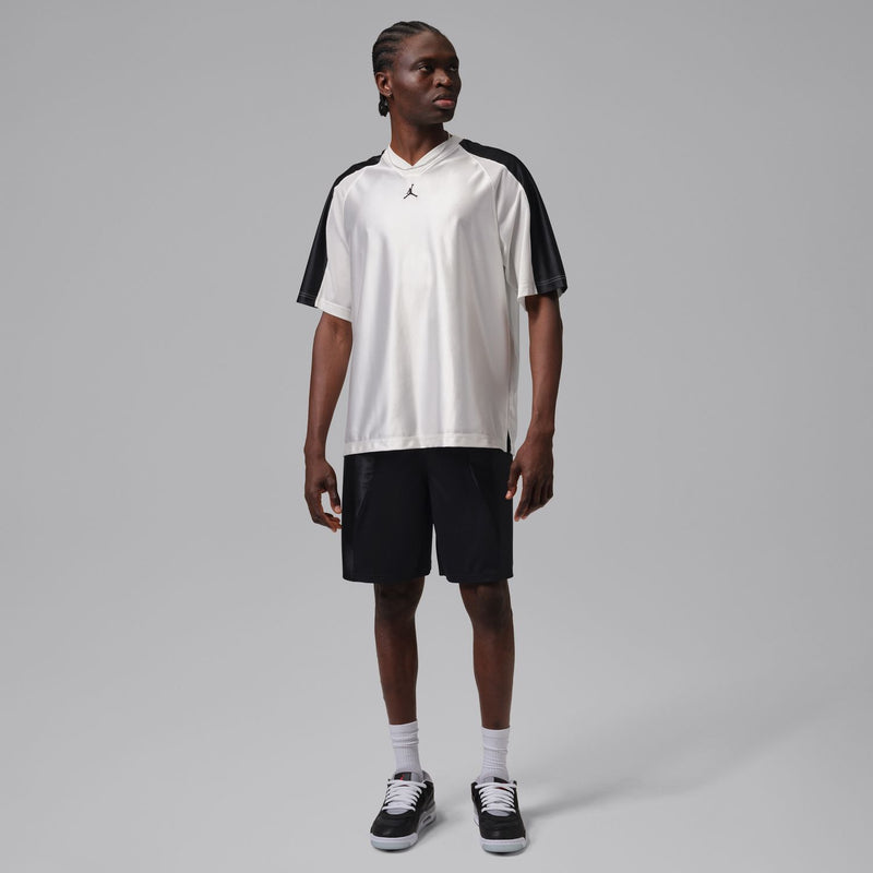 Men's black athletic shorts with elastic waistband and mid-thigh length