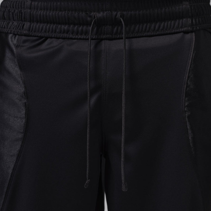 Black shorts with elastic waistband, drawcord, and front seam panel details