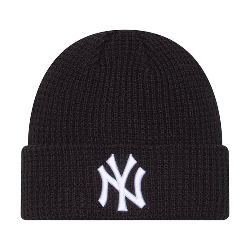 Navy knit waffle beanie with white NY logo patch at cuff
