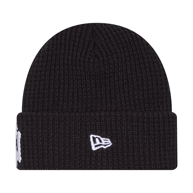 Navy knit waffle beanie with small New Era logo on cuff