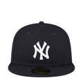 Dark baseball cap with white Yankees “NY” logo on the front panel