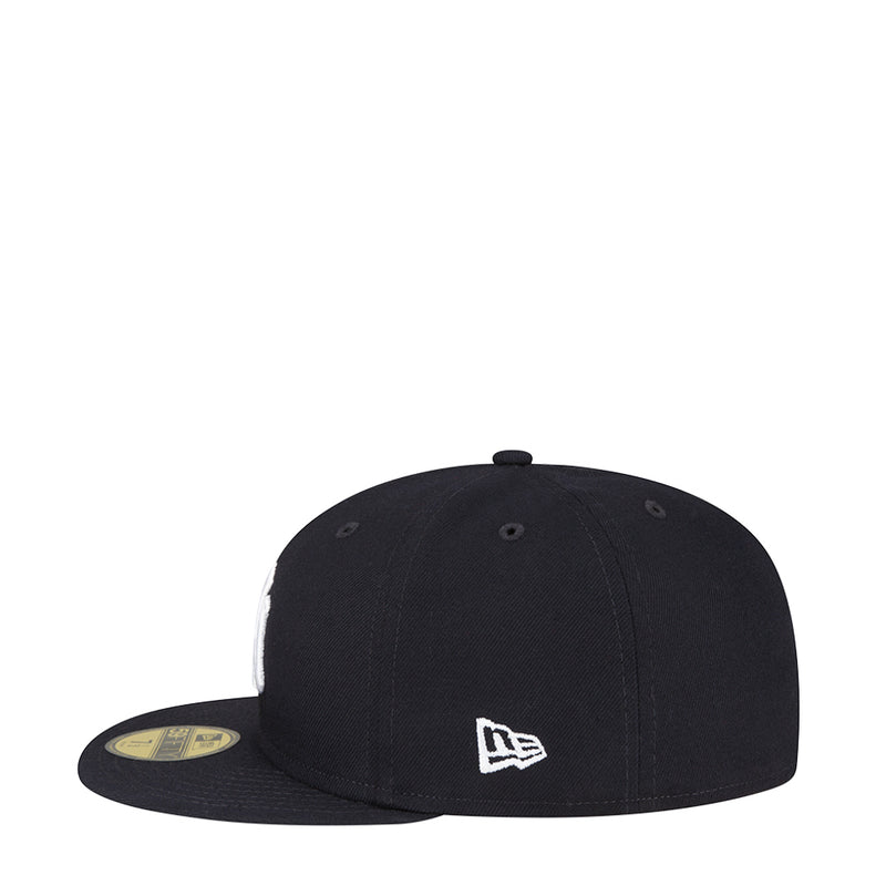 Dark baseball cap with white New Era logo near the front side
