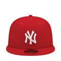 Red baseball cap with white NY Yankees logo on front