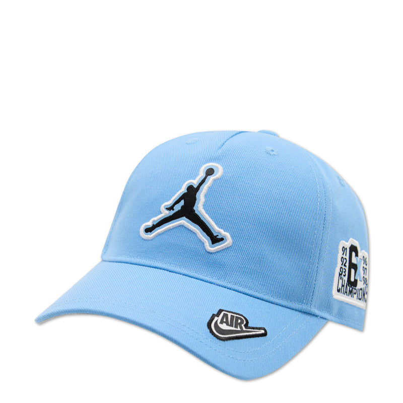 Youth Jordan curved-brim cap in University blue with Jordan and AIR logos