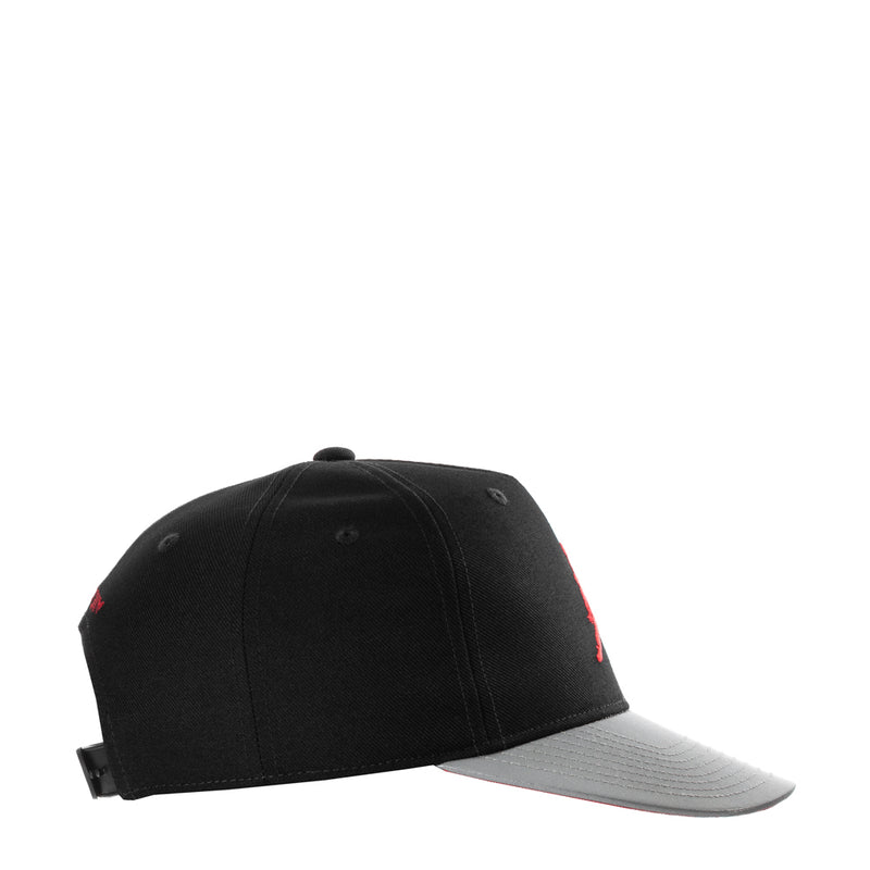 Youth snapback cap, black crown with light gray curved brim and red side detail