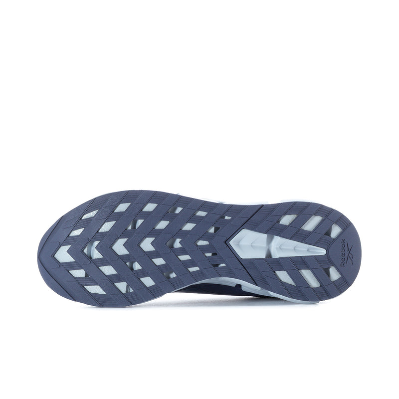 Men's navy Reebok running shoe outsole tread with zigzag pattern and white inserts