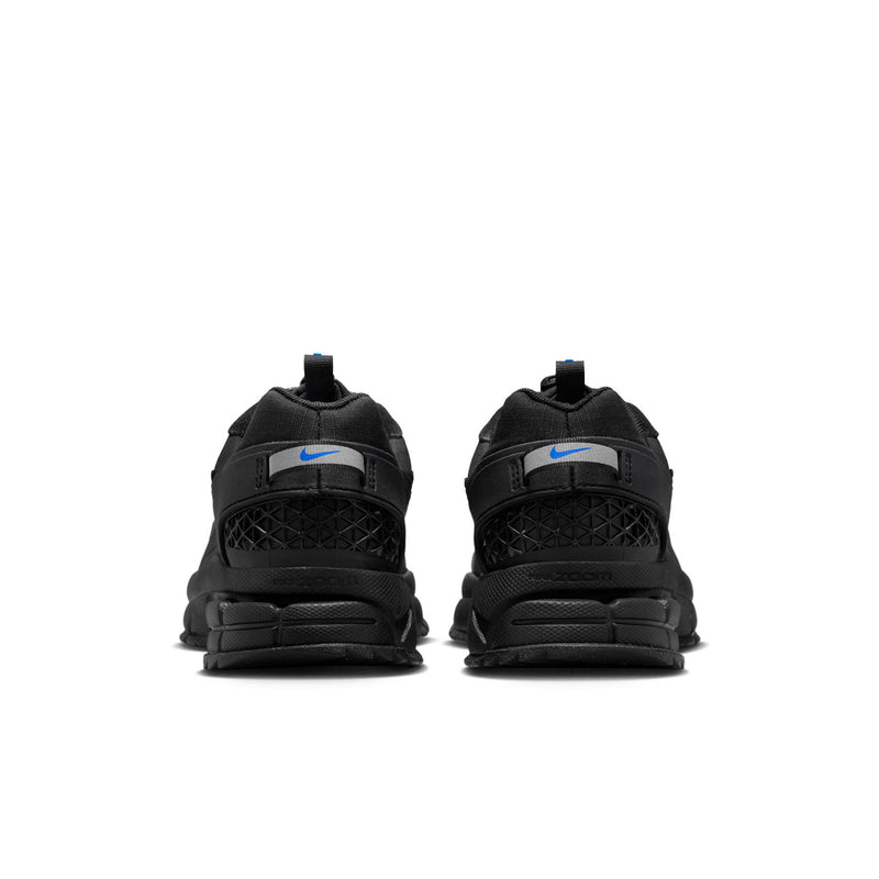 Women’s black trail running shoes with padded heel and blue logo accents