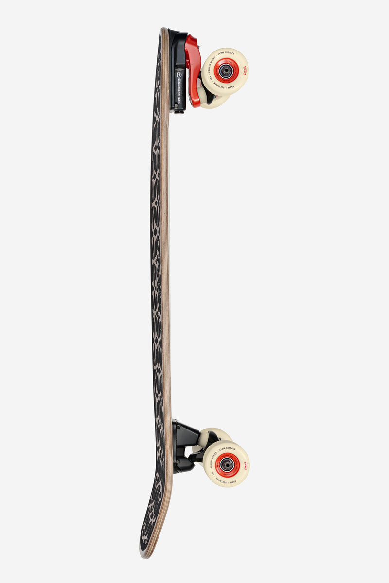 Underside view of Zuma Surf Skate 31 Coconut Voyager with pink lattice pattern and Globe logo.