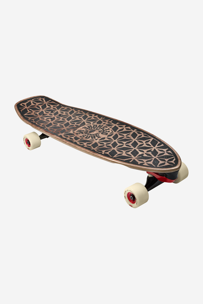 Zuma Surf Skate 31 inch board with coconut husk graphic on the deck, cream wheels and red truck accents.